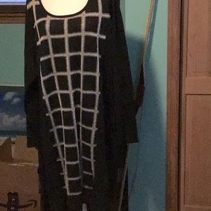 Black sweater dress with gold and silver.